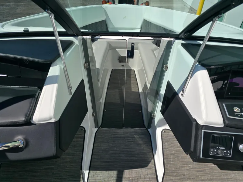 Slide: The Image of 2025 Four Winns H4 boat interior with sleek design and modern features. - 15