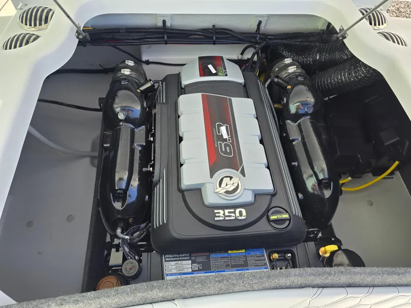 Slide: The Image of 2025 Four Winns H4 boat engine compartment with 6.2L 350 horsepower engine. - 25