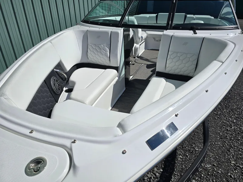 Slide: The Image of 2025 Four Winns H4 boat with white seating and modern interior design. - 4