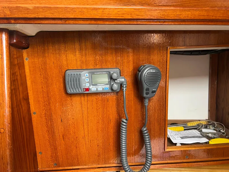 Slide: The Image of VHF radio and microphone on 1988 Cape Dory 30 MK II wooden interior. - 21