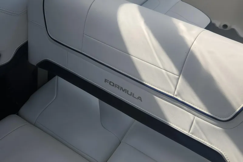 Slide: The Image of 2018 Formula 270 BR boat interior with white leather seating. - 17