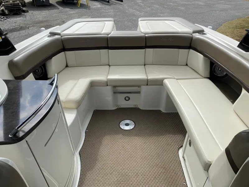 Slide: The Image of 2013 Sea Ray 270 SLX boat interior with sink and seating area. - 13