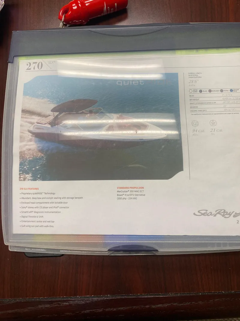 Slide: The Image of Engine of a 2013 Sea Ray 270 SLX boat, featuring a powerful V8 configuration. - 19