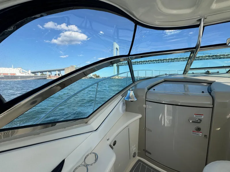 Slide: The Image of Interior view of 2007 Sea Ray 440 Sundancer with scenic bridge and water backdrop. - 10