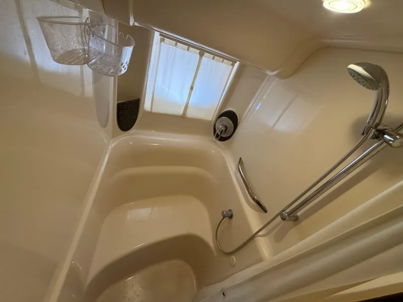Slide: The Image of Luxurious bathroom shower in 2007 Sea Ray 440 Sundancer yacht. - 23