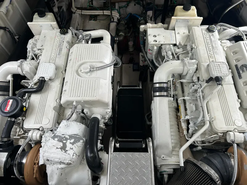 Slide: The Image of Twin engines of a 2007 Sea Ray 440 Sundancer yacht. - 24