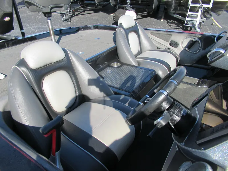 Slide: The Image of 2016 Ranger Z520C boat interior with dual seats and steering wheel. - 3