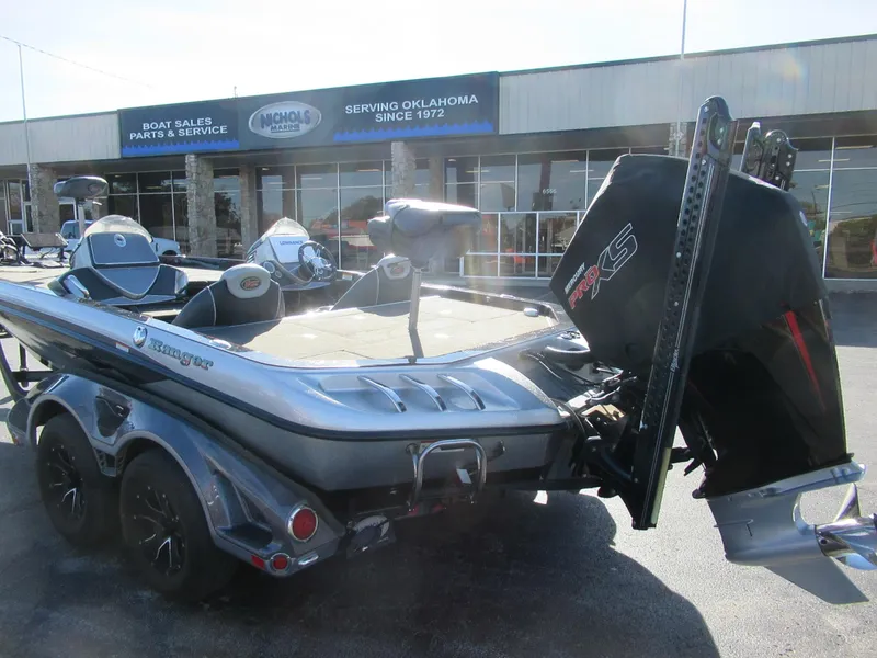 Slide: The Image of 2016 Ranger Z520C boat parked outside Nichols Marine dealership. - 6