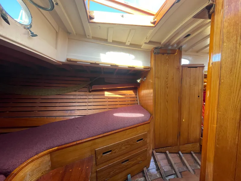 Slide: The Image of Interior of 1961 Sparkman & Stephens Pipe Dream Cruising Sloop with wooden finish and skylight. - 12