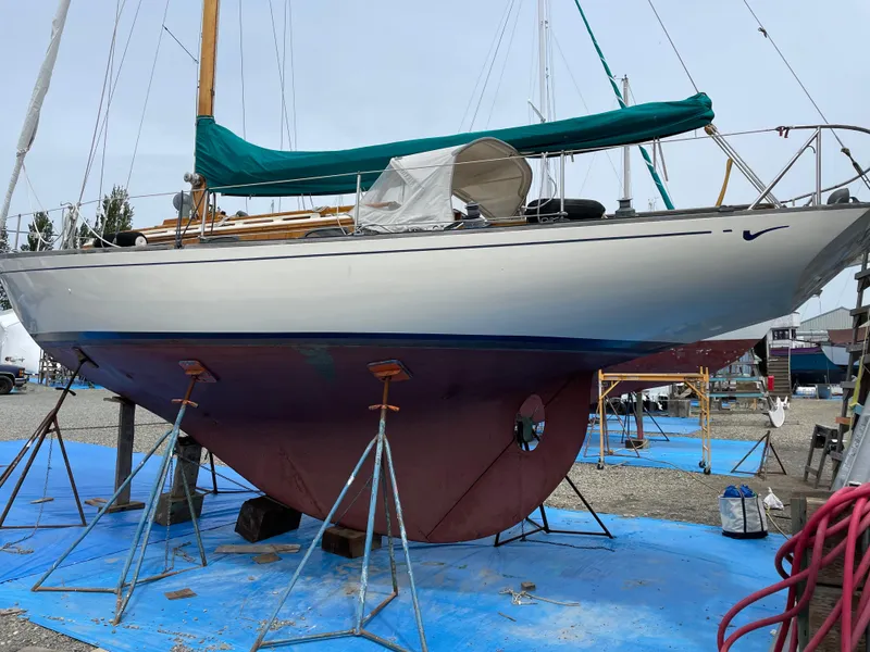 Slide: The Image of 1961 Sparkman & Stephens Pipe Dream Cruising Sloop on stands, with green sail cover. - 27