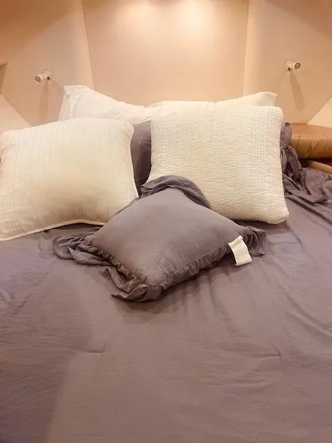 Slide: The Image of Cozy bedroom with plush pillows on a Maxum 4100 SCB yacht, 1999 model. - 9