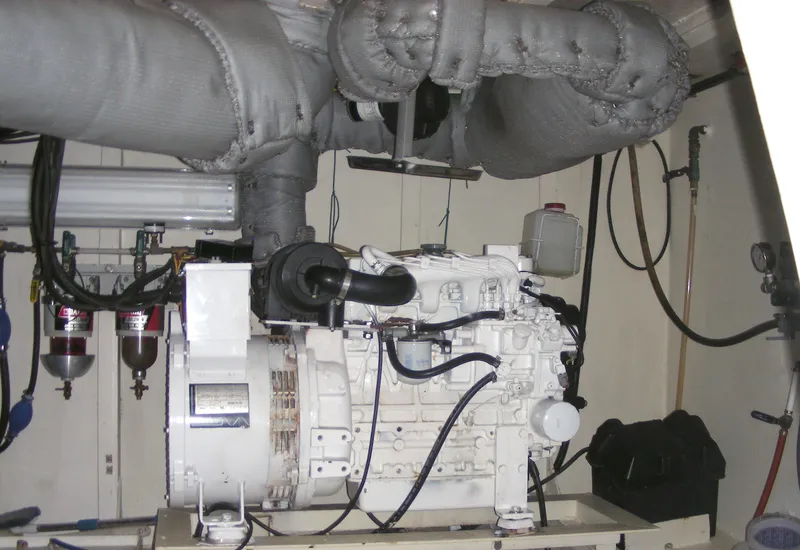 Slide: The Image of Engine room of a 2000 Expedition custom model with machinery and cables. - 20