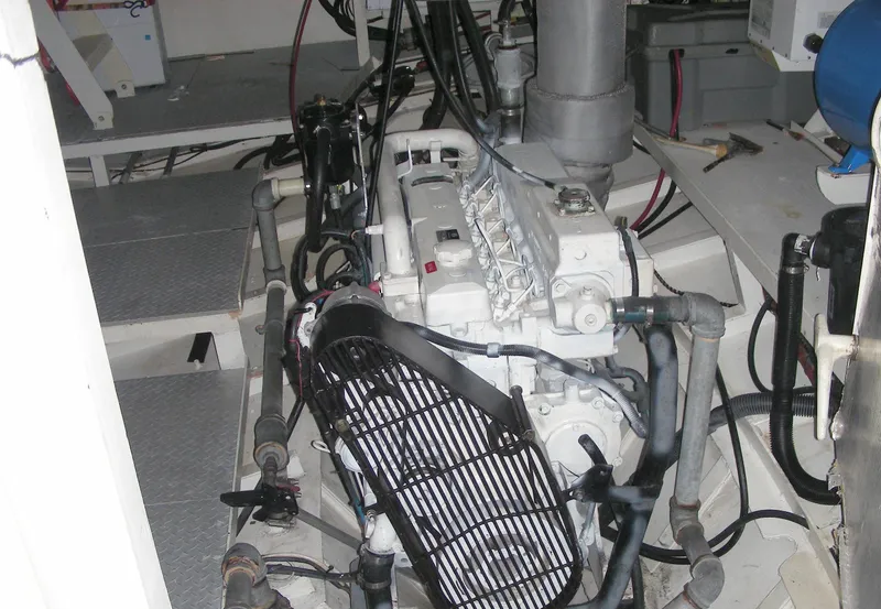 Slide: The Image of Engine room of a 2000 Expedition custom model, featuring complex wiring and machinery. - 23