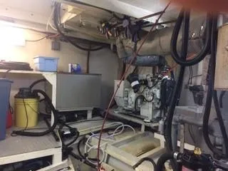 Slide: The Image of Laundry room with washer, dryer, and cleaning supplies on a black cabinet. - 29