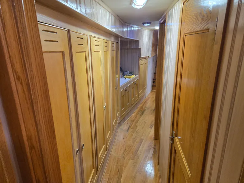 Slide: The Image of Bunk bed with green and blue bedding in a 2000 Expedition custom model. - 33