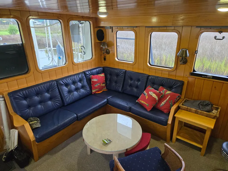 Slide: The Image of Narrow wooden hallway with cabinets in a 2000 Expedition custom model. - 34