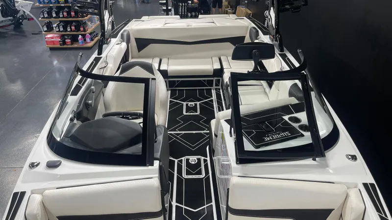 Slide: The Image of 2024 Supreme S220 boat interior with modern seating and sleek design. - 17