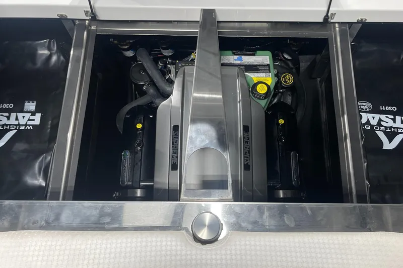 Slide: The Image of 2024 Supreme S220 engine compartment with visible components and branding. - 22