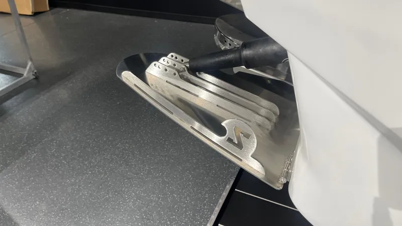 Slide: The Image of 2024 Supreme S220 boat detail, showcasing sleek metal components and modern design. - 4