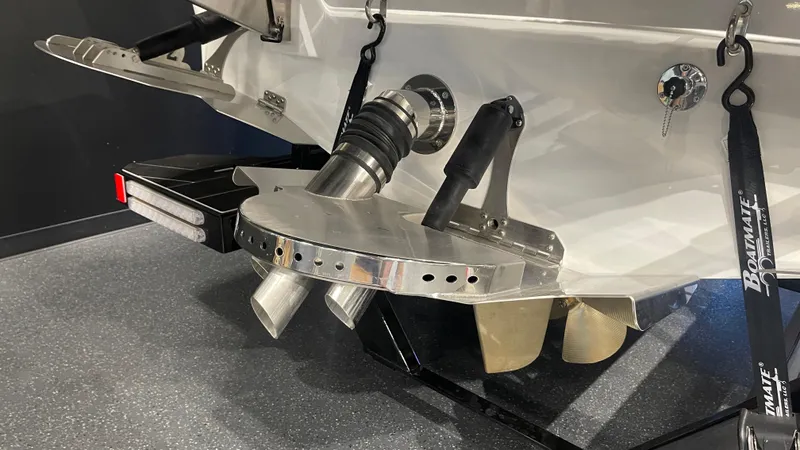 Slide: The Image of 2024 Supreme S220 boat stern with advanced exhaust system and sleek design. - 5