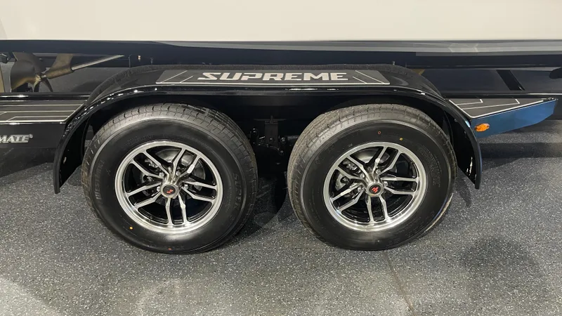 Slide: The Image of 2024 Supreme S220 trailer with dual wheels and sleek design. - 8