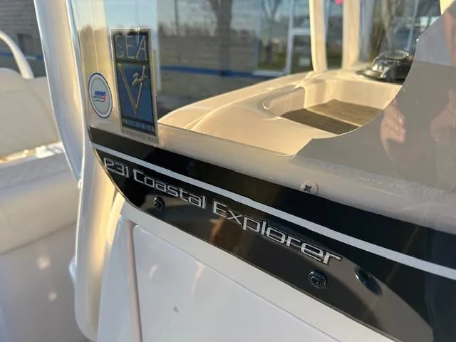 Slide: The Image of Close-up of 2025 Grady-White 231 Coastal Explorer boat dashboard. - 24
