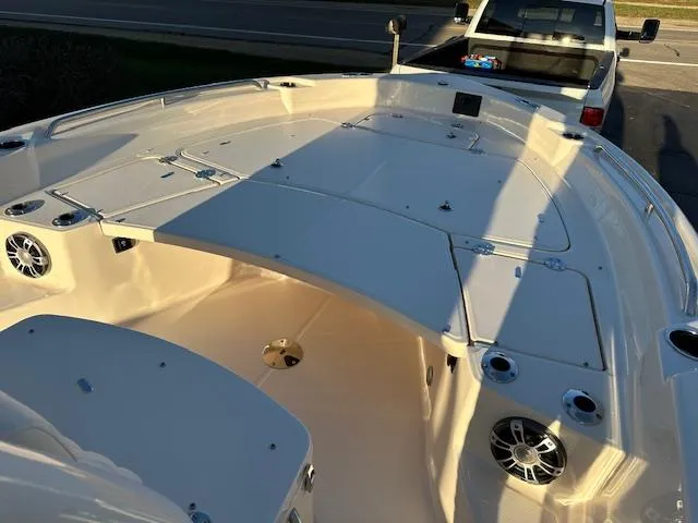 Slide: The Image of 2025 Grady-White 231 Coastal Explorer boat interior, featuring spacious deck and modern design. - 27