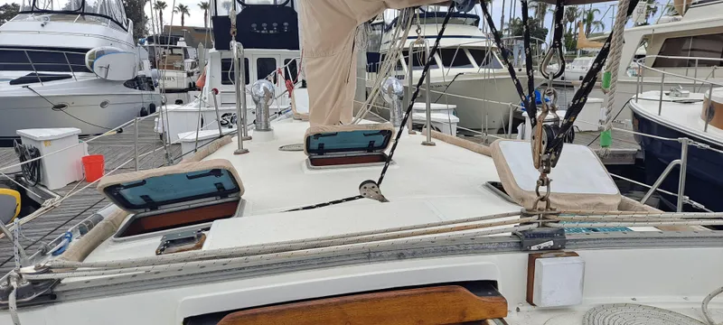 Slide: The Image of 1985 Cheoy Lee Pedrick 38w sailboat deck with hatches and rigging in marina. - 7
