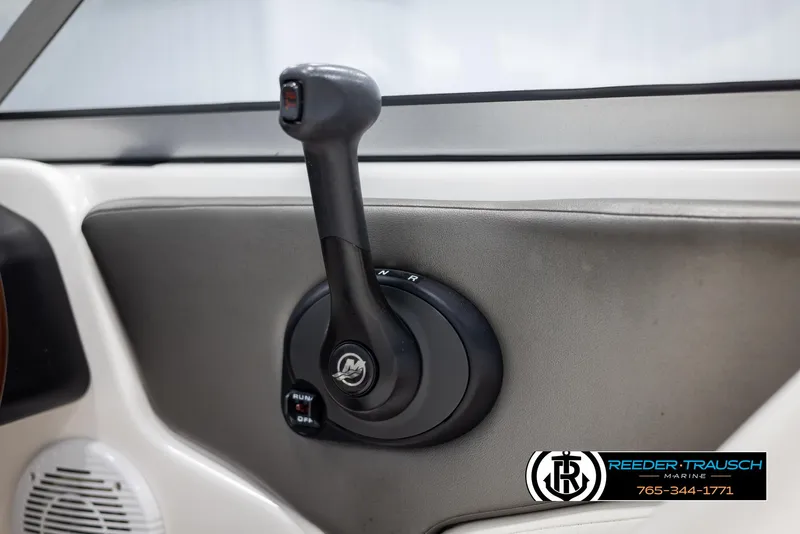Slide: The Image of 2008 Regal 1900 boat throttle control with Reeder-Trausch Marine logo. - 33