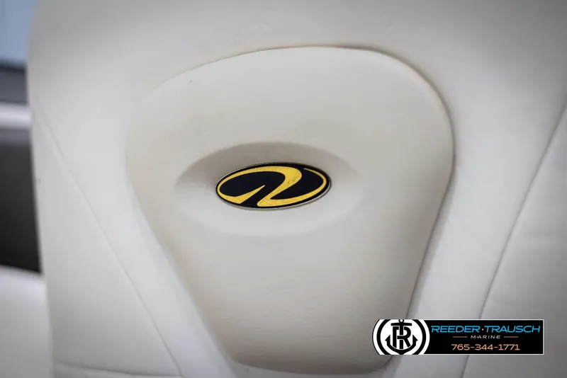 Slide: The Image of 2008 Regal 1900 boat seat with logo, featuring Reeder-Trausch Marine branding. - 35