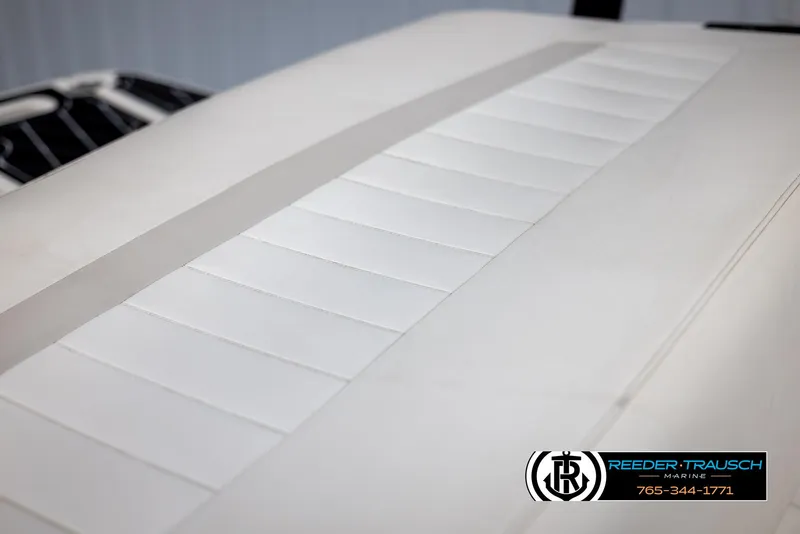 Slide: The Image of Close-up of 2008 Regal 1900 boat upholstery with Reeder-Trausch Marine logo. - 38