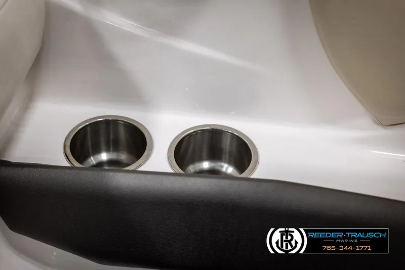 Slide: The Image of Cup holders in a 2008 Regal 1900 boat interior. - 41