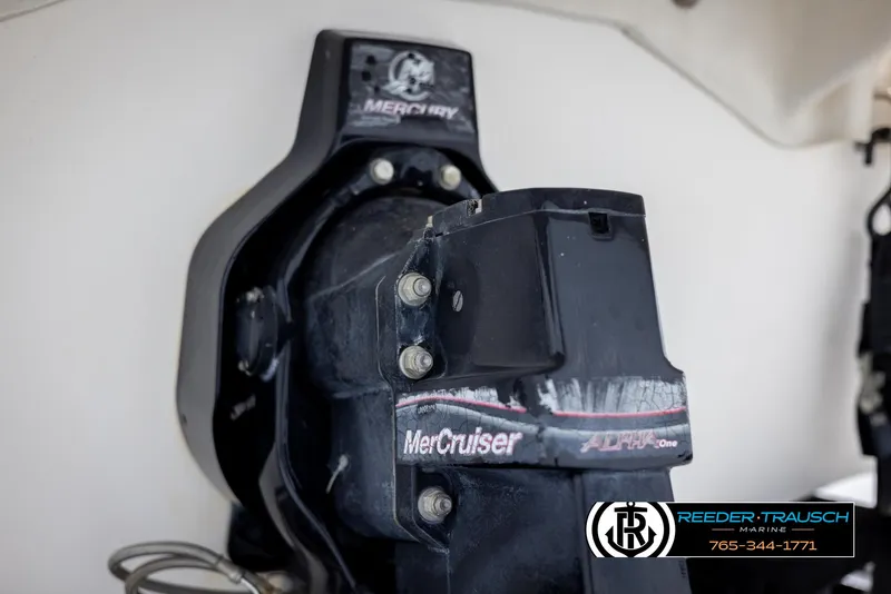 Slide: The Image of MerCruiser engine on 2008 Regal 1900 boat, featuring Reeder-Trausch Marine branding. - 47