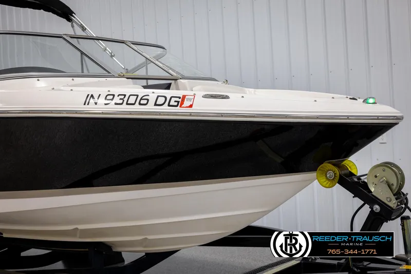 Slide: The Image of 2008 Regal 1900 boat on trailer in indoor storage facility. - 5