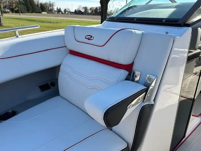 Slide: The Image of 2025 Regal LS9 Surf boat interior with white and red seating. - 18