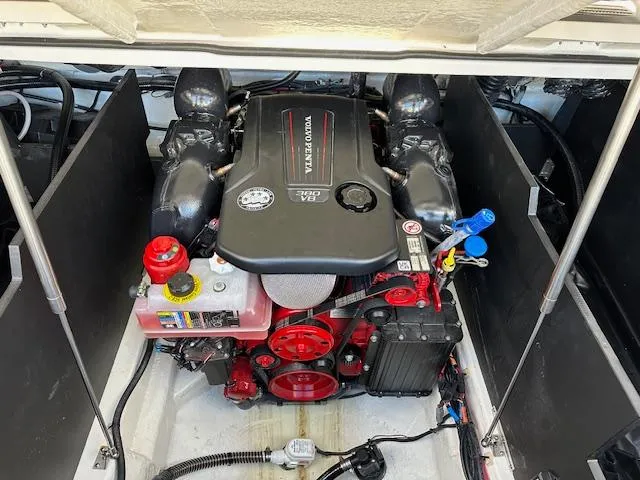 Slide: The Image of 2025 Regal LS9 Surf boat engine compartment with Volvo Penta engine. - 24