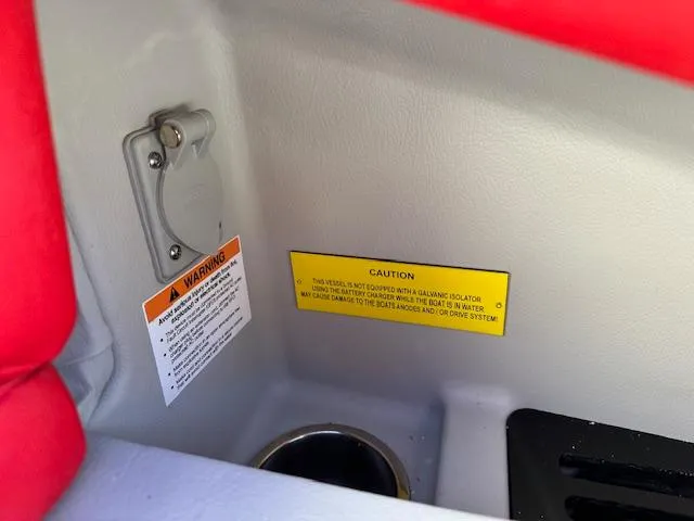 Slide: The Image of Warning labels inside 2025 Regal LS9 Surf boat, highlighting safety precautions. - 34