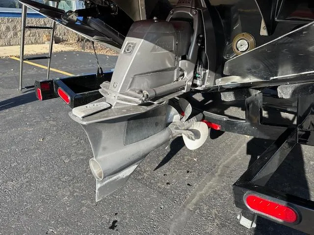 Slide: The Image of 2025 Regal LS9 Surf boat propeller and stern on trailer. - 38