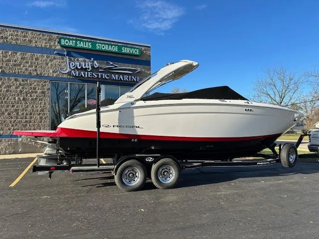 Slide: The Image of 2025 Regal LS9 Surf boat on trailer at Jerry's Majestic Marine dealership. - 45