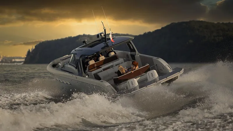 Slide: The Image of Wiszniewski Yachts W43, 2025 model, navigating choppy waters at sunset. - 3