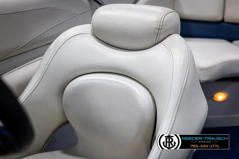 Slide: The Image of Close-up of 2006 Crownline 230 LS boat seat with white upholstery. - 35