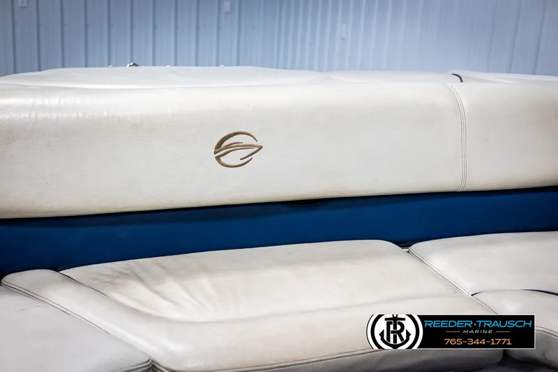 Slide: The Image of Crownline 230 LS 2006 boat seating with logo, white and blue upholstery. - 36