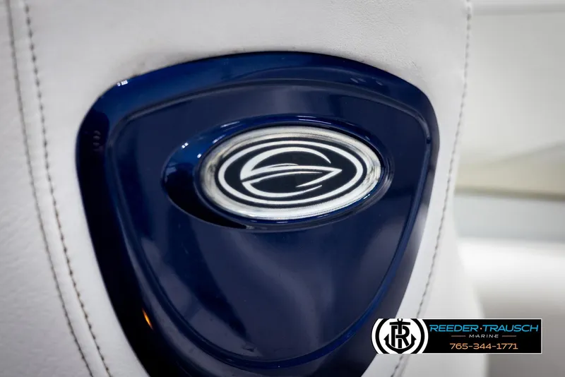 Slide: The Image of Close-up of 2006 Crownline 230 LS boat emblem on white upholstery. - 38