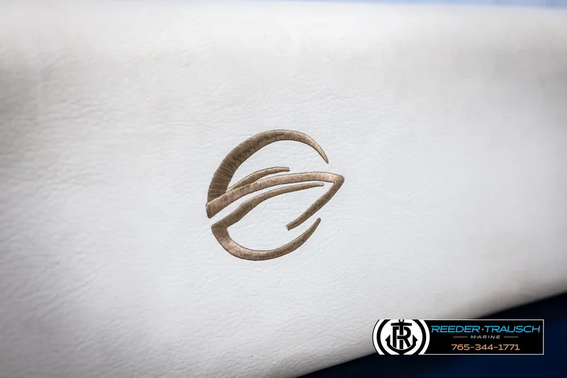 Slide: The Image of Crownline 230 LS 2006 boat logo on white surface, Reeder-Trausch Marine branding. - 39