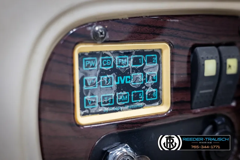 Slide: The Image of Control panel of a 2002 Chaparral 243 Sunesta boat with JVC electronics. - 31