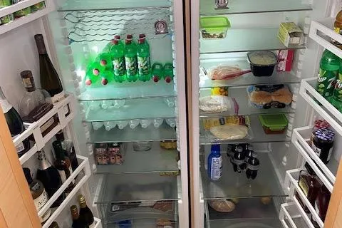 Slide: The Image of Well-stocked fridge on Lagoon 620 yacht, 2014 model. - 11