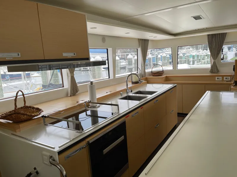 Slide: The Image of Spacious kitchen in 2014 Lagoon 620 yacht. - 13