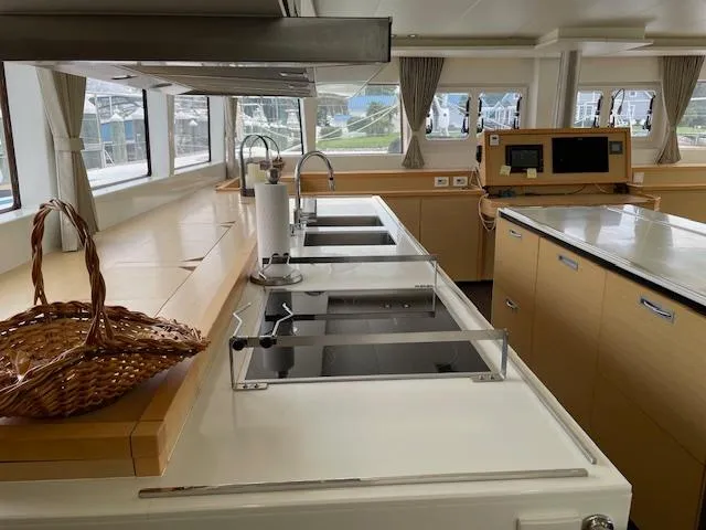 Slide: The Image of Modern kitchen on Lagoon 620 catamaran, year 2014. - 21