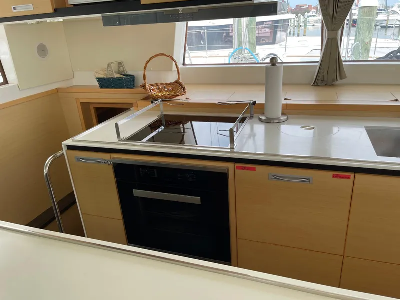 Slide: The Image of Interior view of a Lagoon 620 yacht kitchen, 2014 model. - 22