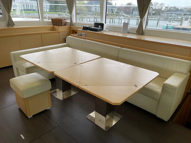 Slide: The Image of Interior of Lagoon 620 yacht, 2014, featuring elegant seating area. - 28